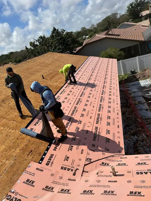 Workers working on a roof
